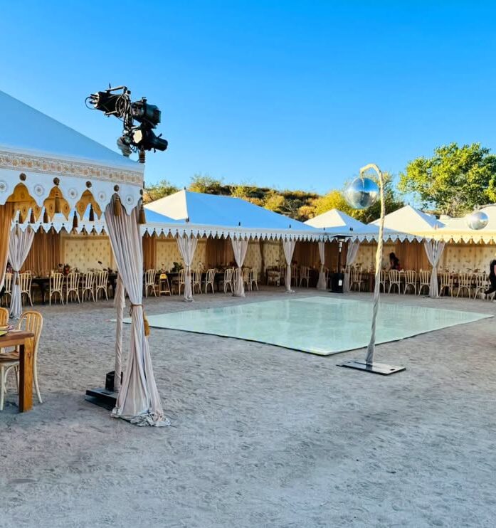 Majestic Arabic desert tent with golden accents and luxurious fabrics, perfect for biblical epics or mystical dream sequences